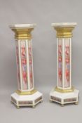A SUPERB PAIR OF OCTAGONAL INLAID MARBLE COLUMNS with gilt metal mounts. 4ft high.