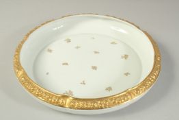A ROSENTHAL DISH with moulded gilt fruit rim and sprays of flowers. Signed in gilt: Hayling, "