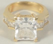 A 14CT GOLD SINGLE STONE RING