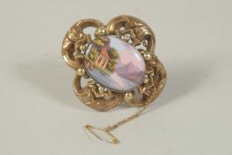 A VICTORIAN 9CT GOLD BROOCH with Swiss enamel pane and locket back