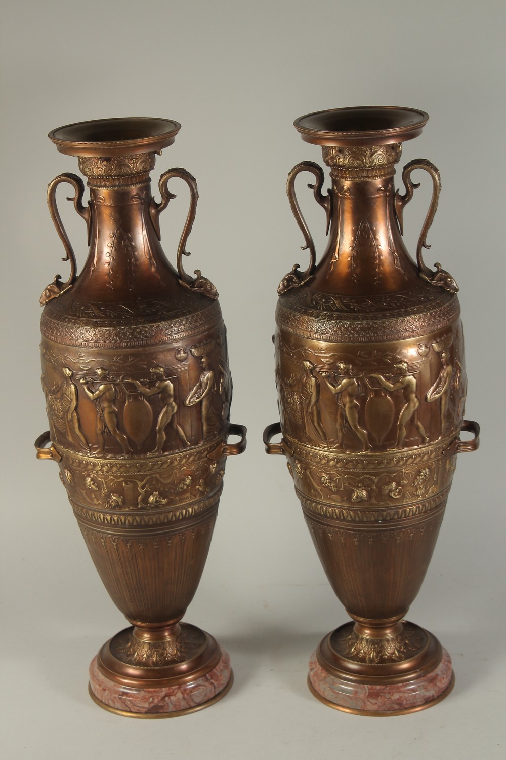 A SUPERB PAIR OF TWO-HANDLED CLASSICAL BRONZE URNS decorated with panels of classical figures. - Image 4 of 4