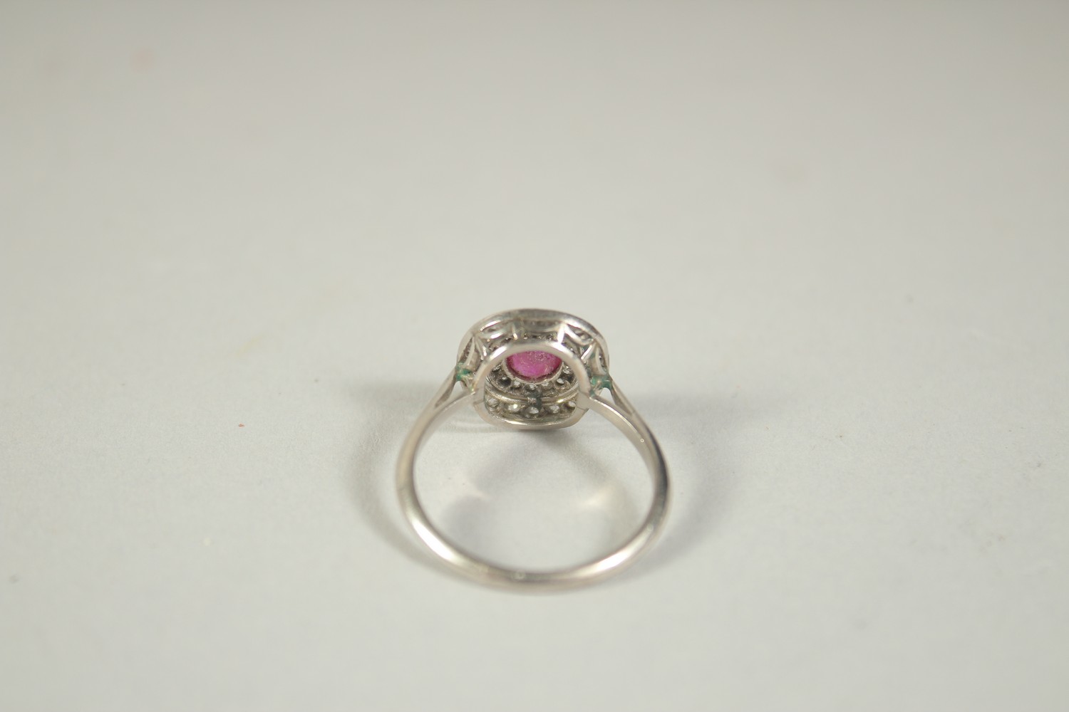 A RUBY AND DIAMOND CLUSTER RING. Size M1/2. - Image 2 of 2
