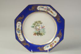 AN 18TH CENTURY SEVRES OCTAGONAL DISH, painted with birds in a landscape, surrounded by eight