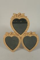 A GILT BRONZE TRIPLE HEART FRAME. 13ins high.