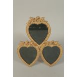 A GILT BRONZE TRIPLE HEART FRAME. 13ins high.