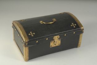 AN 18TH CENTURY BRASS BOUND LEATHER DOMED BOX. 13.5ins high.