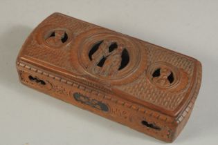 A DUTCH CARVED WOOD BOX. 15cms high.