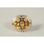 A 9CT GOLD VICTORIAN CITRINE BROOCH with locket back