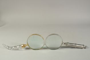 TWO MAGNIFYING GLASSES, one with cut glass handle, the other a chrome handle.