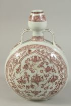 A CHINESE UNDERGLAZE RED PORCELAIN MOONFLASK. 31cms high.