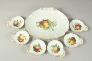 A LARGE MEISSEN SHELL DISH decorated with fruit, 31cms x 24.5cm and SIX SCALLOPED SHAPE DISHES