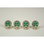 A SET OF FOUR S. MORDAN & Co. SILVER AND GREEN ENAMEL IRISH MENU HOLDERS, decorated with enamel