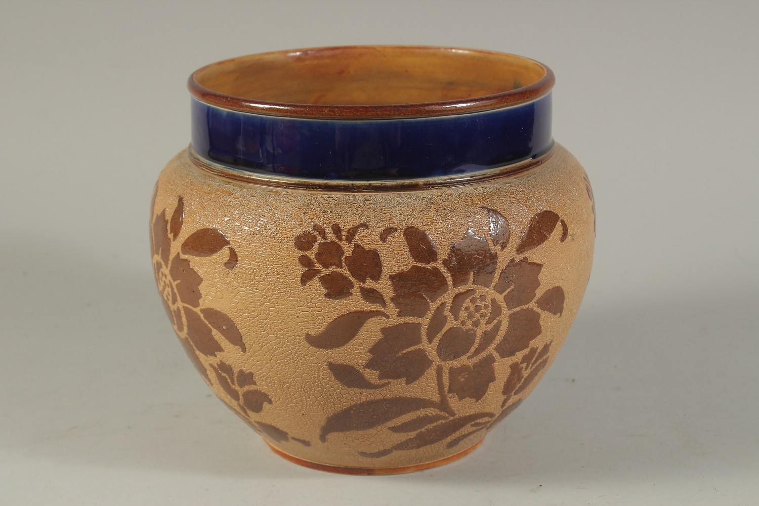 A ROYAL DOULTON SLATERS PATENT STONEWARE CIRCULAR JARDINIERE with blue rim, the body with leaves. - Image 3 of 5