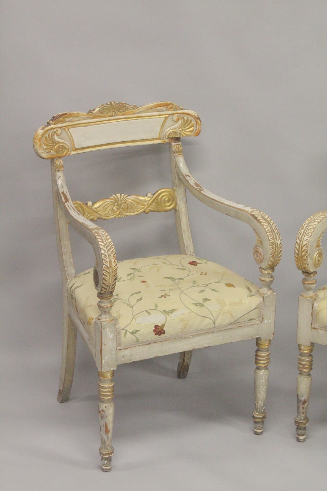 A PAIR OF CARVED, PAINTED AND PARCEL GILDED OPEN ARMCHAIRS, with floral upholstered overstuffed - Image 2 of 5