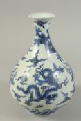 A CHINESE BLUE AND WHITE DRAGON YUHUCHUNPIN VASE. 27cms high.