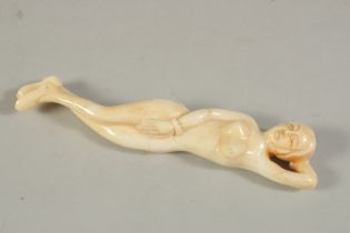 A DOCTORS CARVED BONE FIGURE. 12ins high.