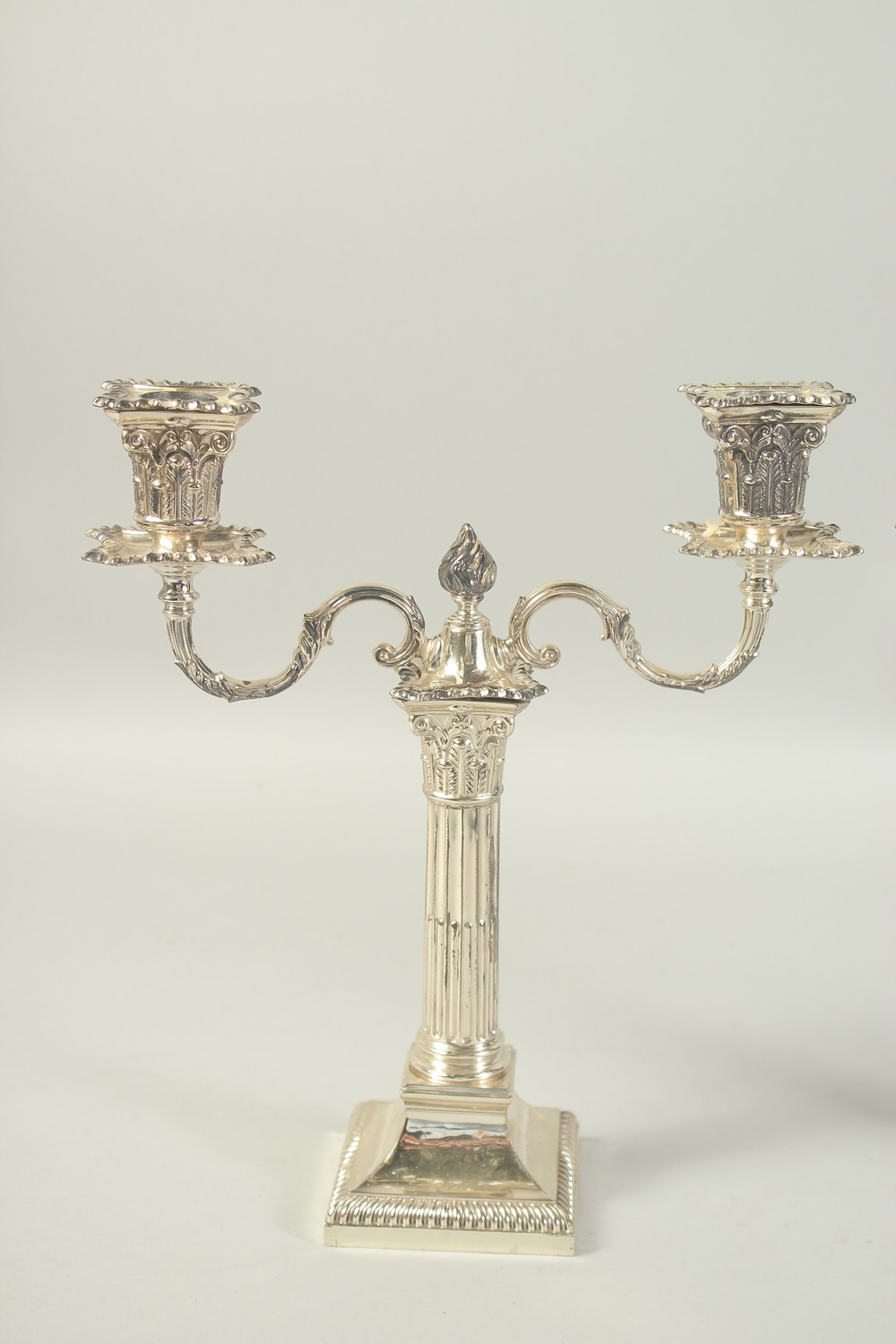 A GOOD PAIR OF TWO BRANCH SILVER CANDLESTICKS with coloums on square bases. 12ins high. London - Image 2 of 6