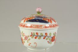 A MEISSEN CABARET SUCRIER AND COVER, painted in kakiemon style, crossed swords in blue.