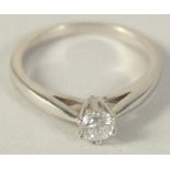 AN 18CT GOLD DIAMOND SINGLE STONE RING 0.24CT.