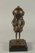AFTER BANKSY A BRONZE GIRL in a diving helmet. Signed.