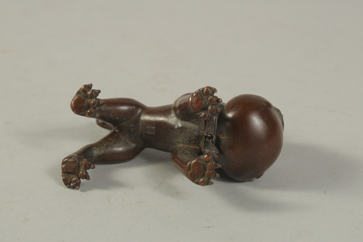 A BRONZE OKIMONO of a Dog. 8cms long. - Image 3 of 3