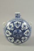 A CHINESE BLUE AND WHITE 'EIGHT TREASURE' MOONFLASK. 29cms high.
