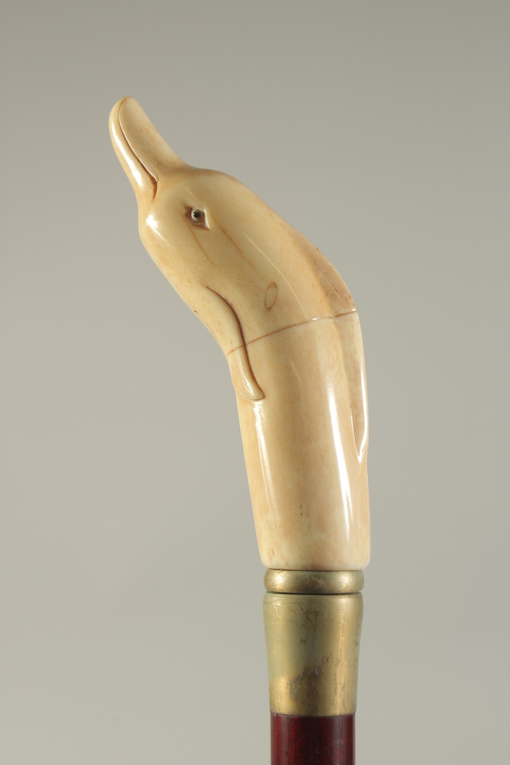 A CARVED BONE HANDLED WALKING STICK "DOLPHIN". - Image 2 of 2