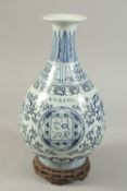 A CHINESE BLUE AND WHITE PORCELAIN YUHUCHUNPIN VASE AND STAND, decorated with panels of