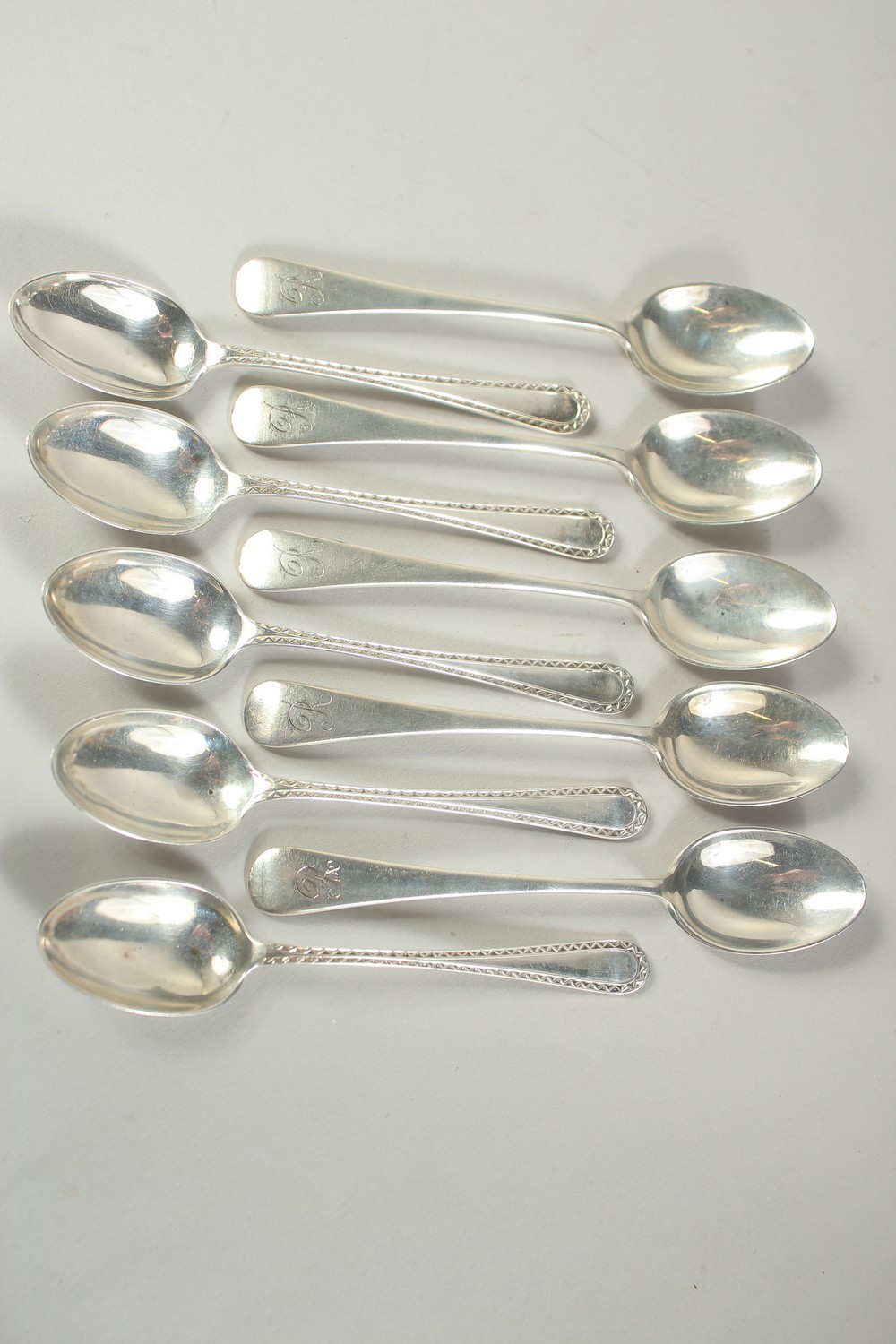 A SET OF TEN SILVER TEA SPOONS. Birmingham 1900.