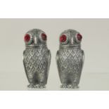 A PAIR OF OWL SILVER PLATED SALT AND PEPPERS.2.75ins.