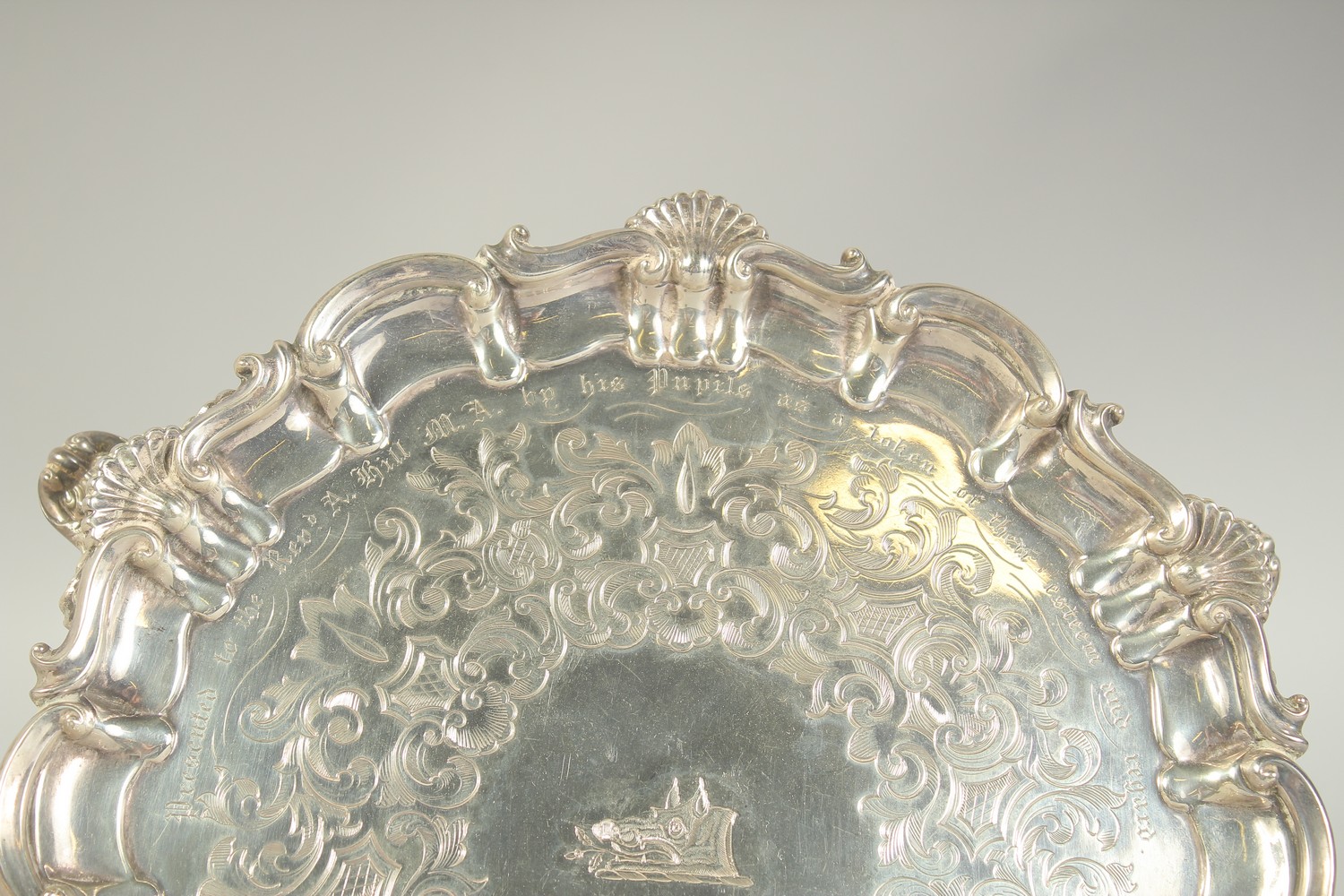 A VICTORIAN SILVER PIE CRUST SALVER with shell border on three curving feet, 8.75ins diameter. - Image 3 of 6