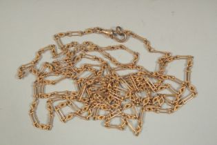 A DELICATE LONG GOLD CHAIN. 54ins long. Weight: 25gms.