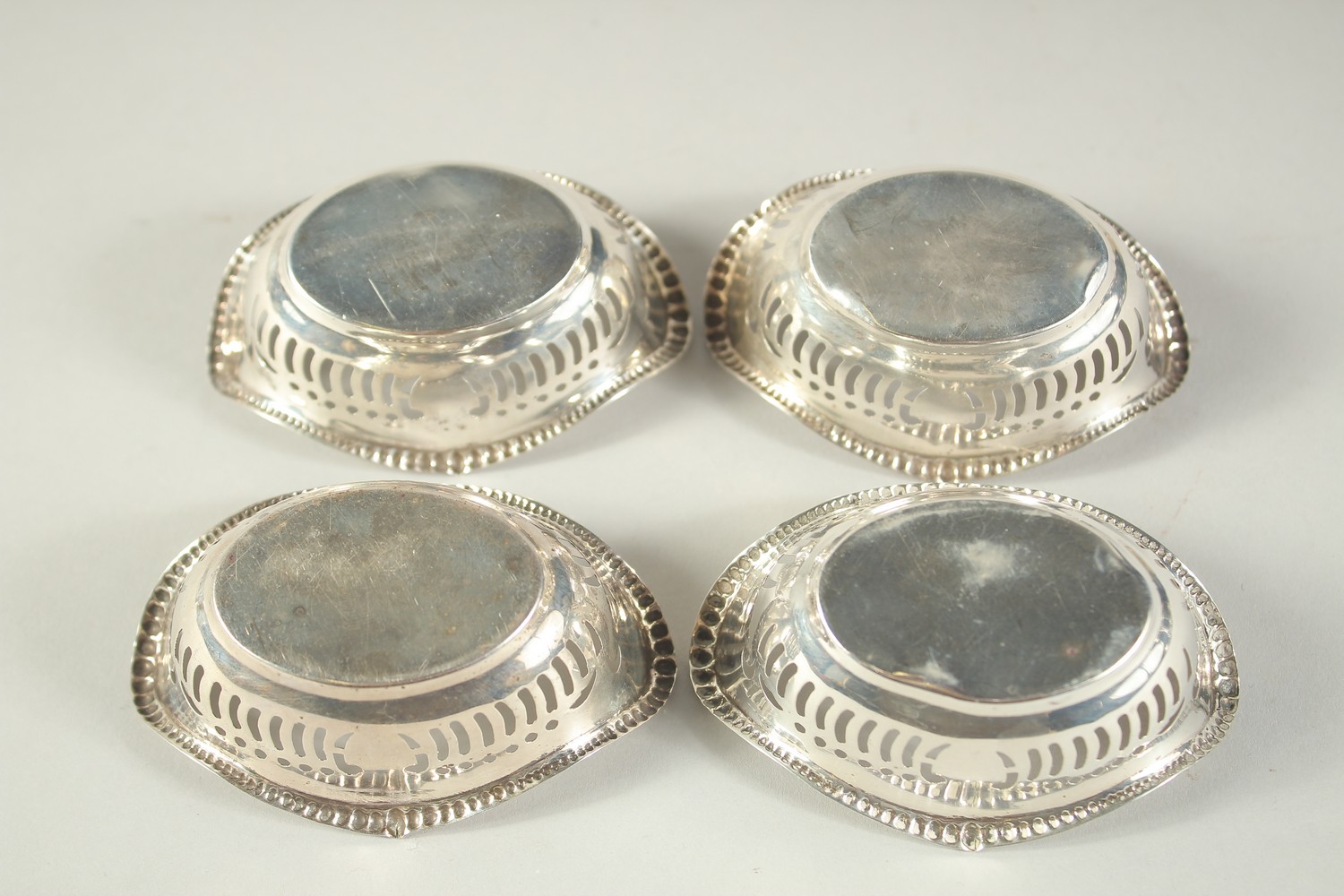 A SET OF FOUR OVAL PIERCED SILVER BON BON DISHES. 3.25ins long. Birmingham 1928. - Image 6 of 6