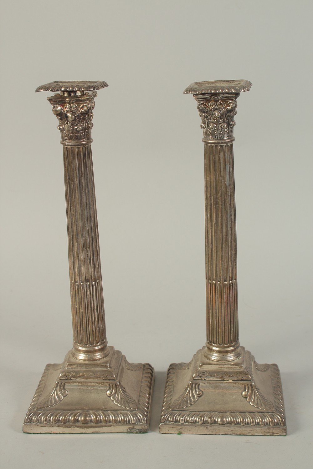 A GOOD PAIR OF VICTORIAN SILVER CORINTHIAN COLUMN CANDLESTICKS on square loaded bases. 13ins high. - Image 2 of 5