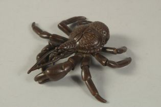 A BRONZE OKIMONO of a Coconut Crab, with articulated legs. 10cms long.