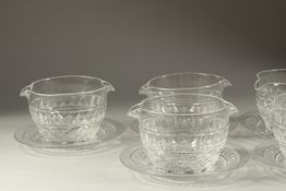 A GOOD SET OF EIGHT DOUBLE LIP BOWLS AND STANDS.