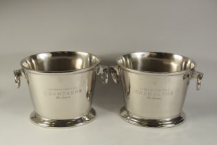 A PAIR OF HEAVY OVAL CHAMPAGNE COOLERS with ring handles.