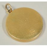 A 15CT GOLD CIRCULAR LOCKET. Dated, 1908. Weight: 5.6gms.