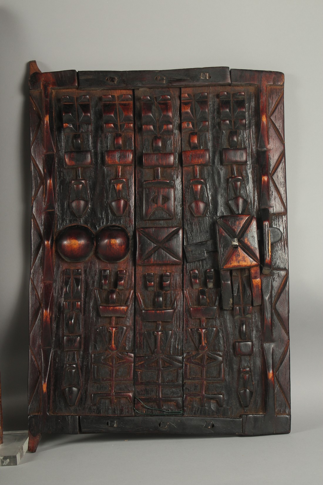 THREE EARLY AFRICAN CARVED WOOD DOORS. 20ins x 13ins - Image 4 of 4