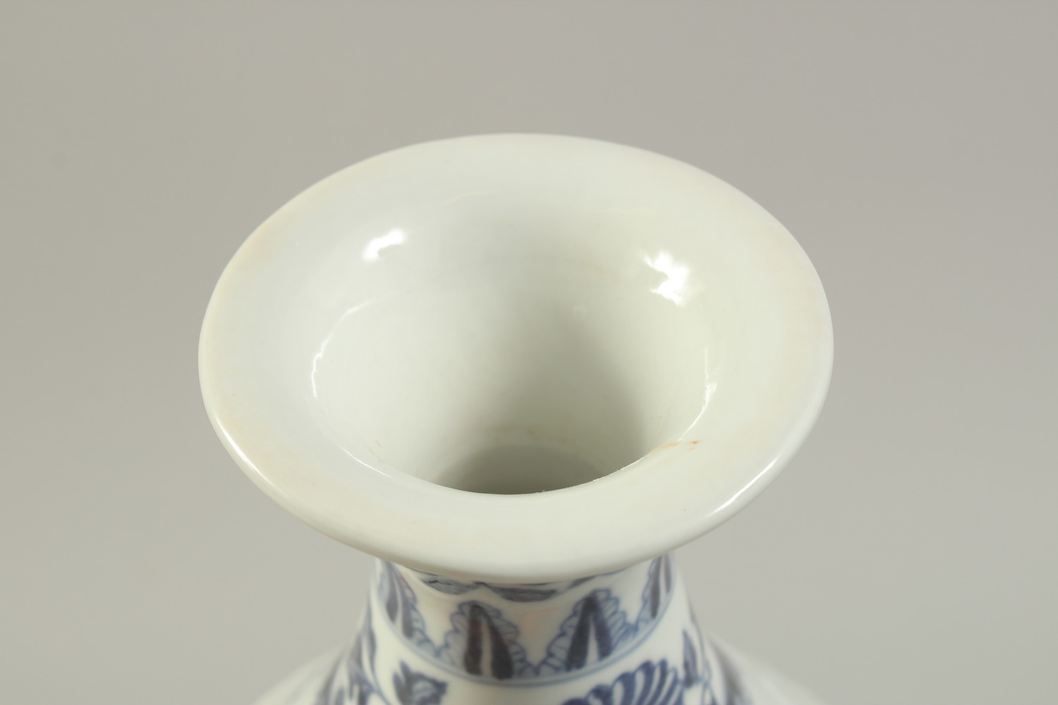 A CHINESE BLUE AND WHITE CARVED FLORAL YUHUCHUNPIN VASE. 32cms high. - Image 5 of 6