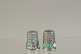 TWO RUSSIAN SILVER AND ENAMEL THIMBLES.