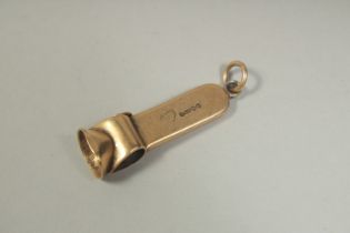 A 15CT GOLD CIGAR CUTTER.