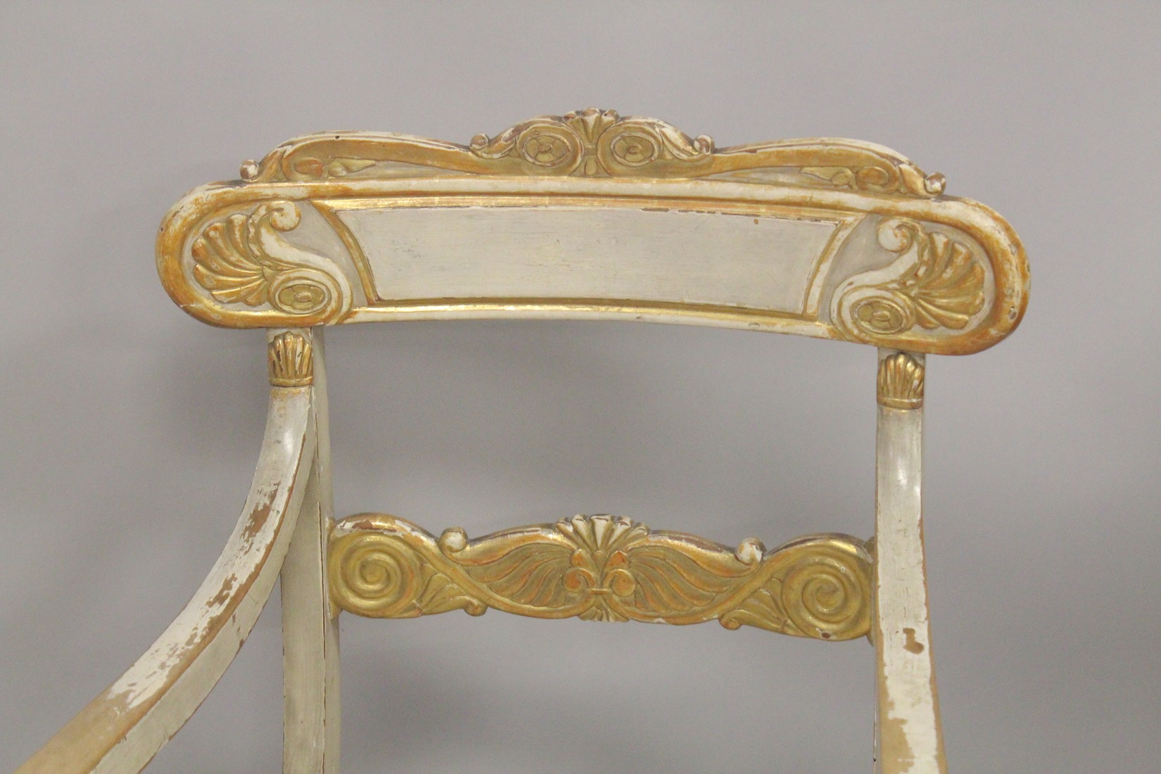 A PAIR OF CARVED, PAINTED AND PARCEL GILDED OPEN ARMCHAIRS, with floral upholstered overstuffed - Image 5 of 5