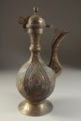 A FINE INDIAN BRASS EWER, with embossed and chased fish decoration, 40cm high.