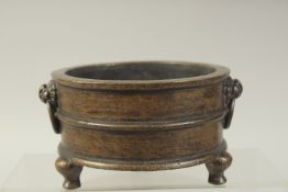 A CHINESE BRONZE TRIPOD CENSER, base with character mark, bowl 13cm diameter.