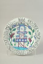 A TURKISH OTTOMAN IZNIK PLATE WITH GREEK INSCRIPTIONS, 31cm diameter.