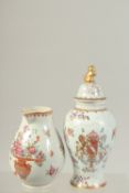 A FAMILLE ROSE ARMORIAL PORCELAIN LIDDED JAR, together with a famille rose porcelain floral jug, (