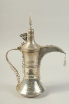 A LARGE OMAN NIZWA SILVER COFFEE POT DALLAH, in a fitted presentation box, coffee pot 37cm high.