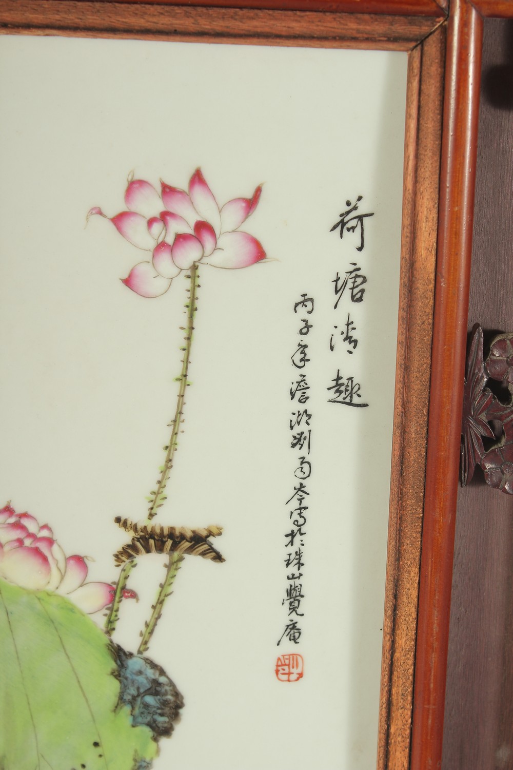 A CHINESE FAMILLE ROSE PORCELAIN PLAQUE, inset within a wooden frame, panel 56cm x 19cm. - Image 2 of 3
