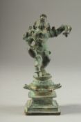 A FINE 16TH-17TH CENTURY SOUTH INDIAN BRONZE FIGURE OF BABY KRISHNA, stand on a lotus form base,